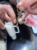 White keychain tumbler with charm and extra ring