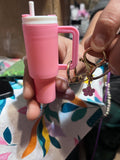 Pink keychain tumbler with charm and extra ring