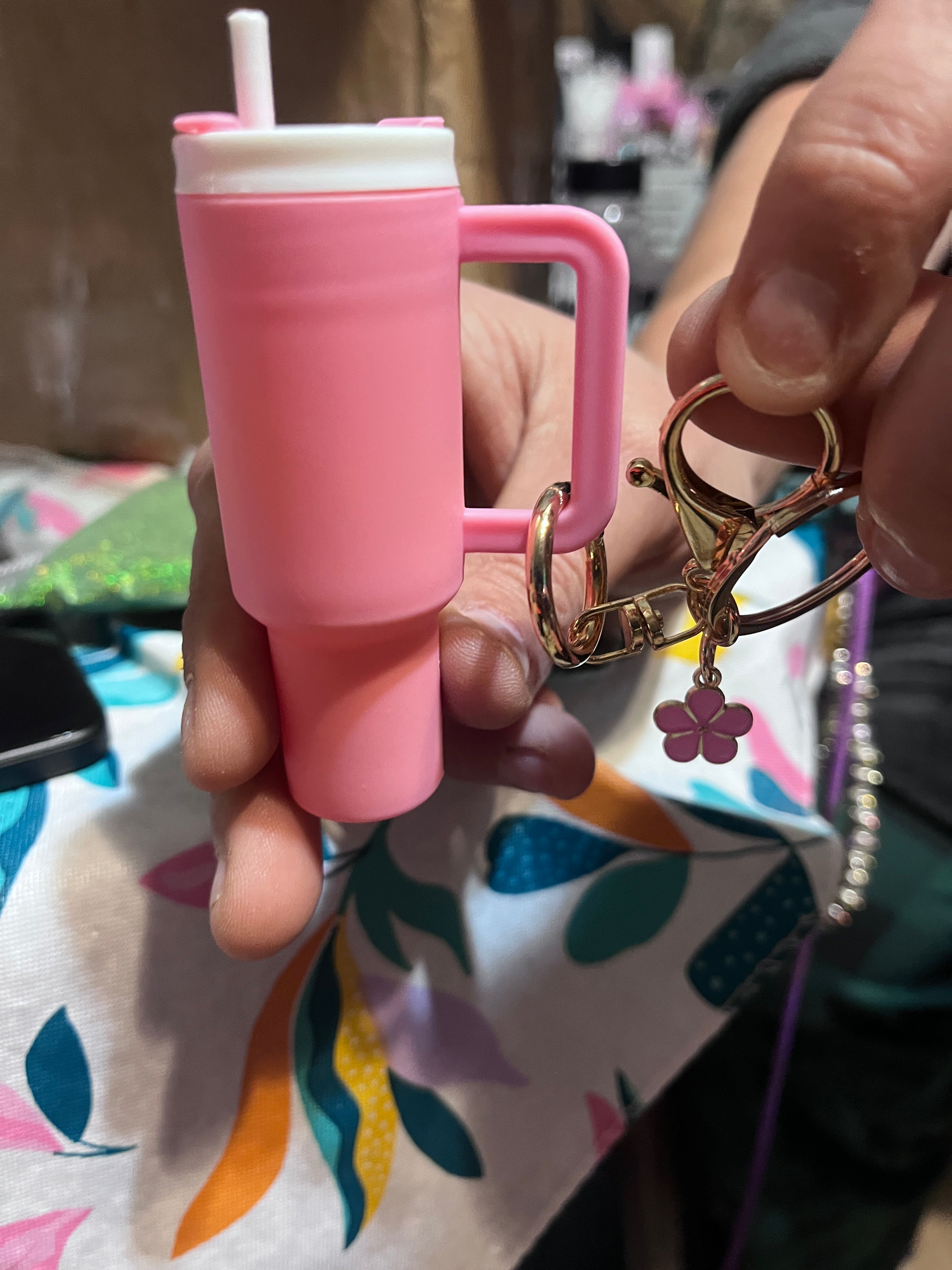 Pink keychain tumbler with charm and extra ring